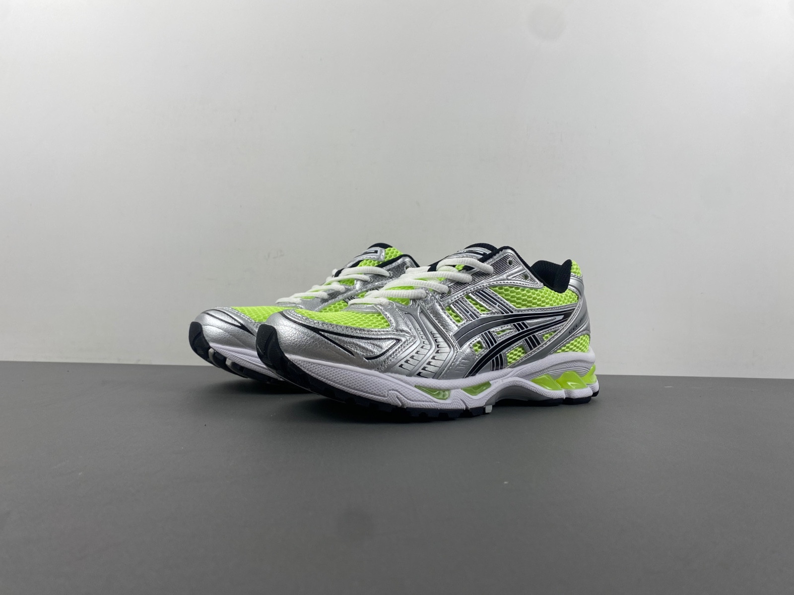 As*ic*s mesh-panelling lace-up sneakers 1202a056300