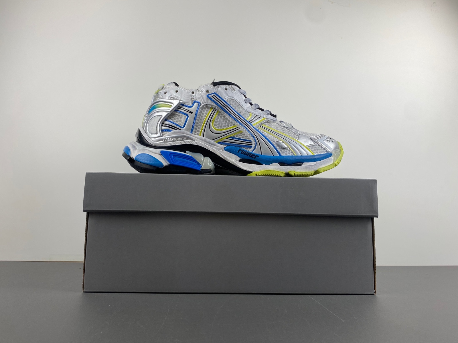 Ba*len*cia*ga runner sneaker in white/yellow/blue