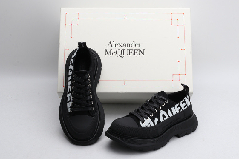 alex mcq tread slick lace up in black with letters