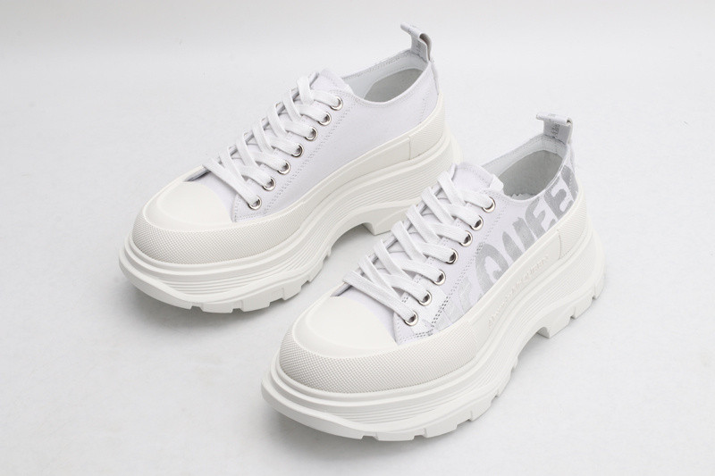 alex mcq tread slick lace up in white