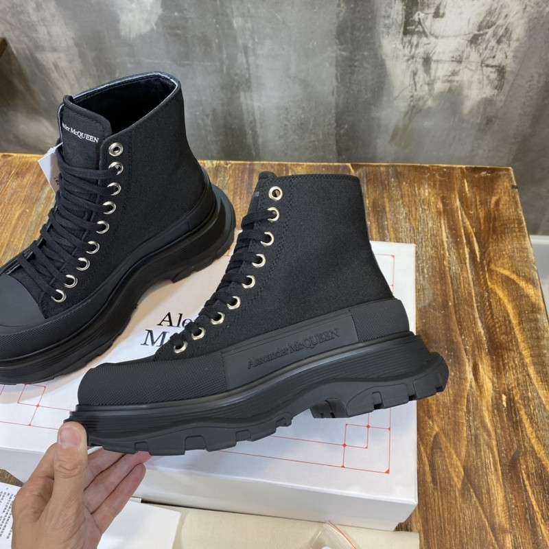 alex mcq tread slick boot in black