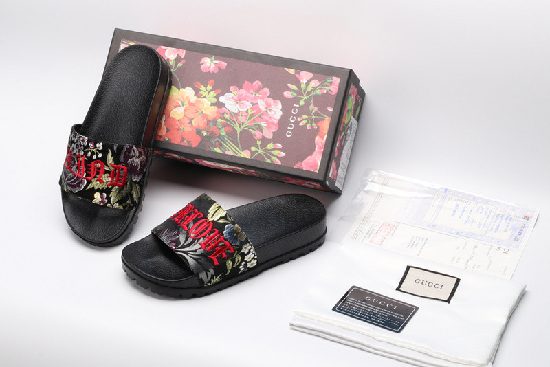 G*u*i slides all black with flower