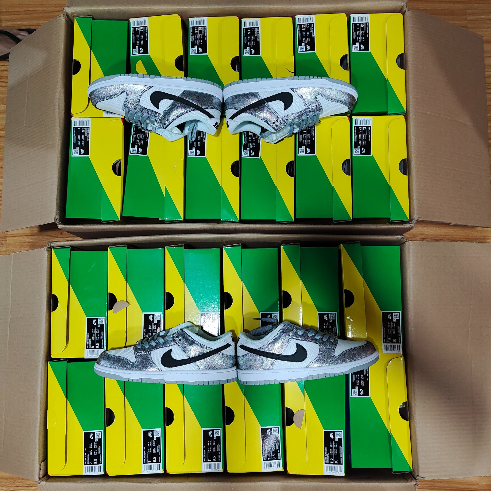 the nike dunk low features silver cracked leather do5882-001