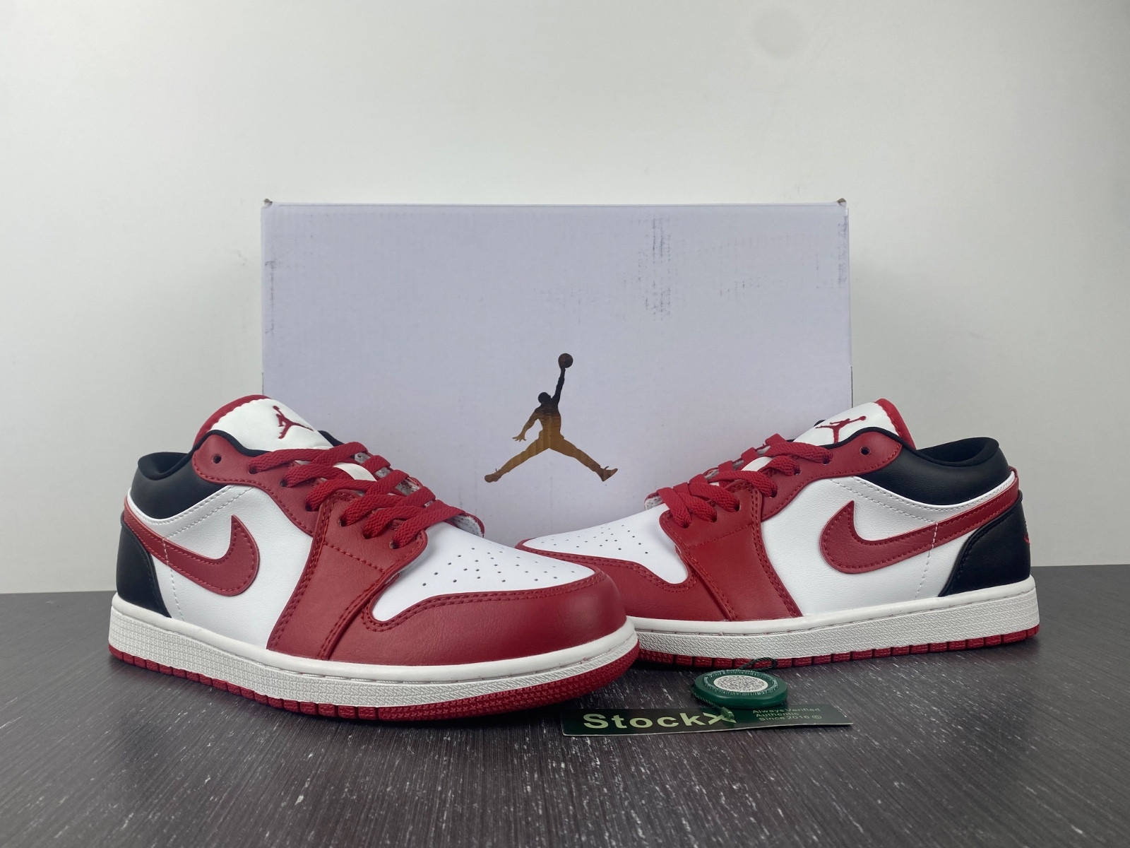jordan 1 low reverse black toe (women
