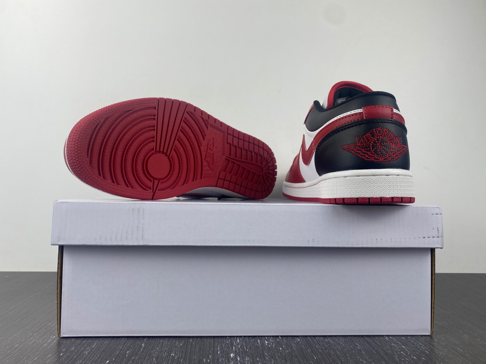 jordan 1 low reverse black toe (women