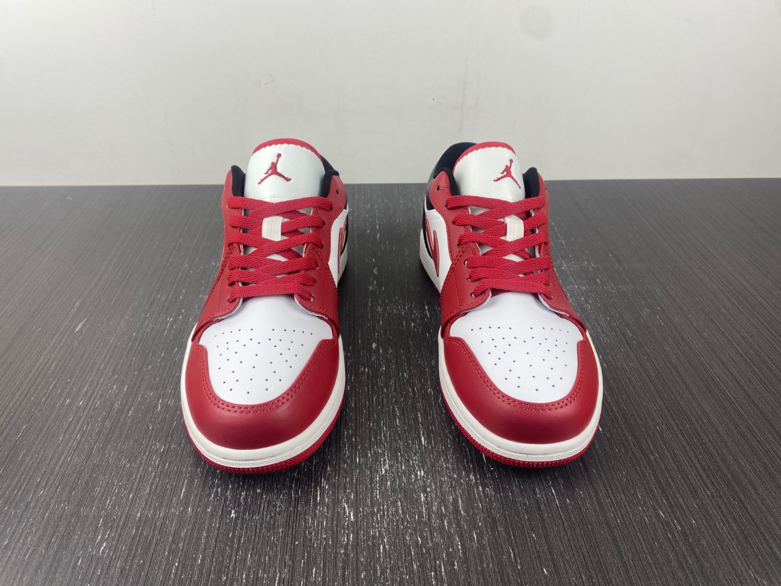 jordan 1 low reverse black toe (women