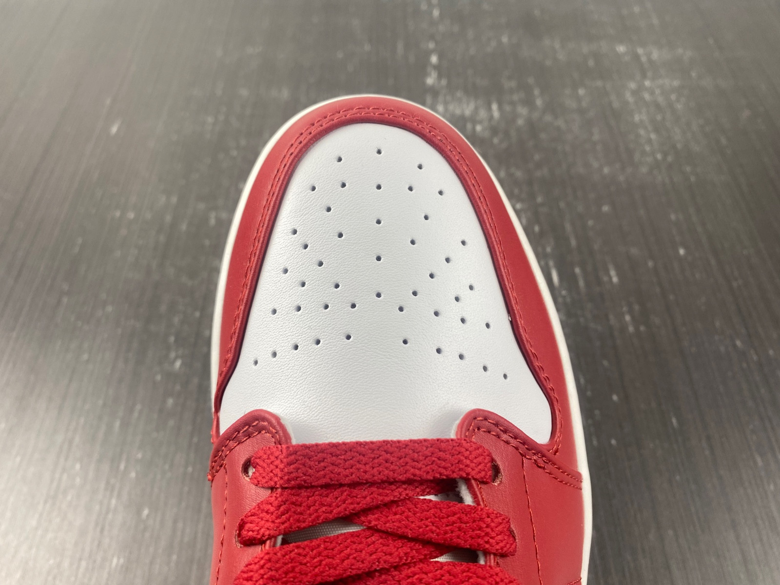 jordan 1 low reverse black toe (women