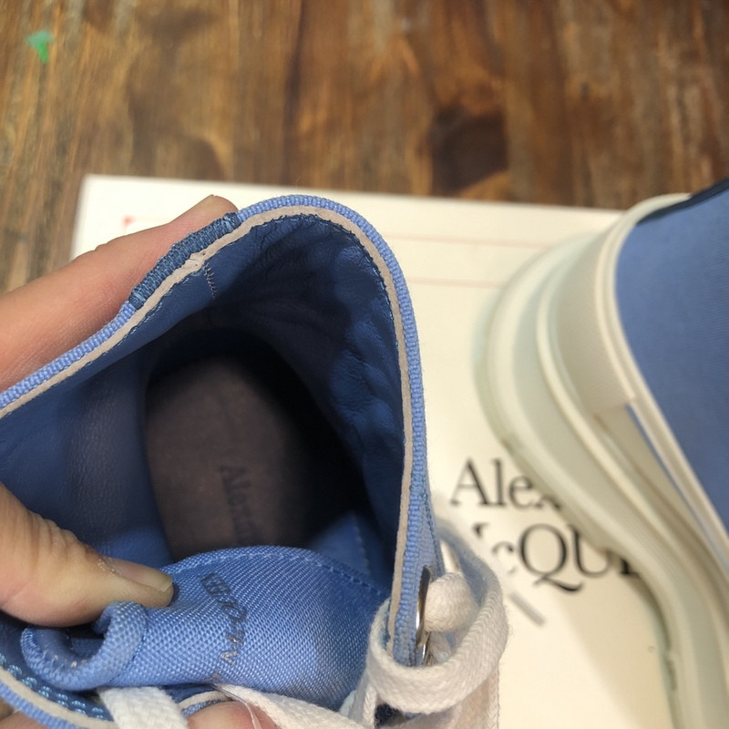 alex mcq tread slick boot in black