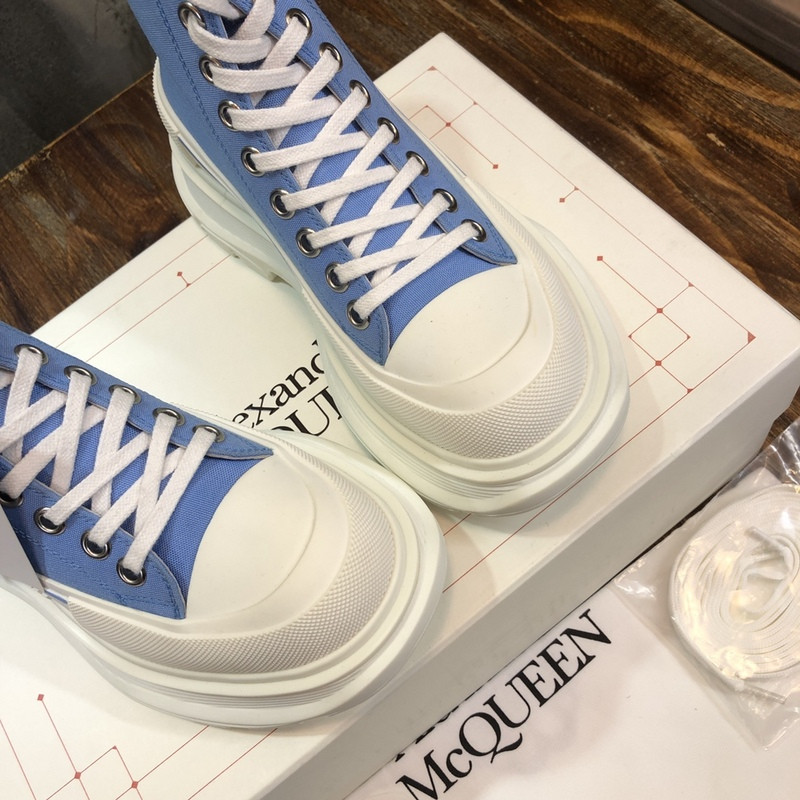 alex mcq tread slick boot in black