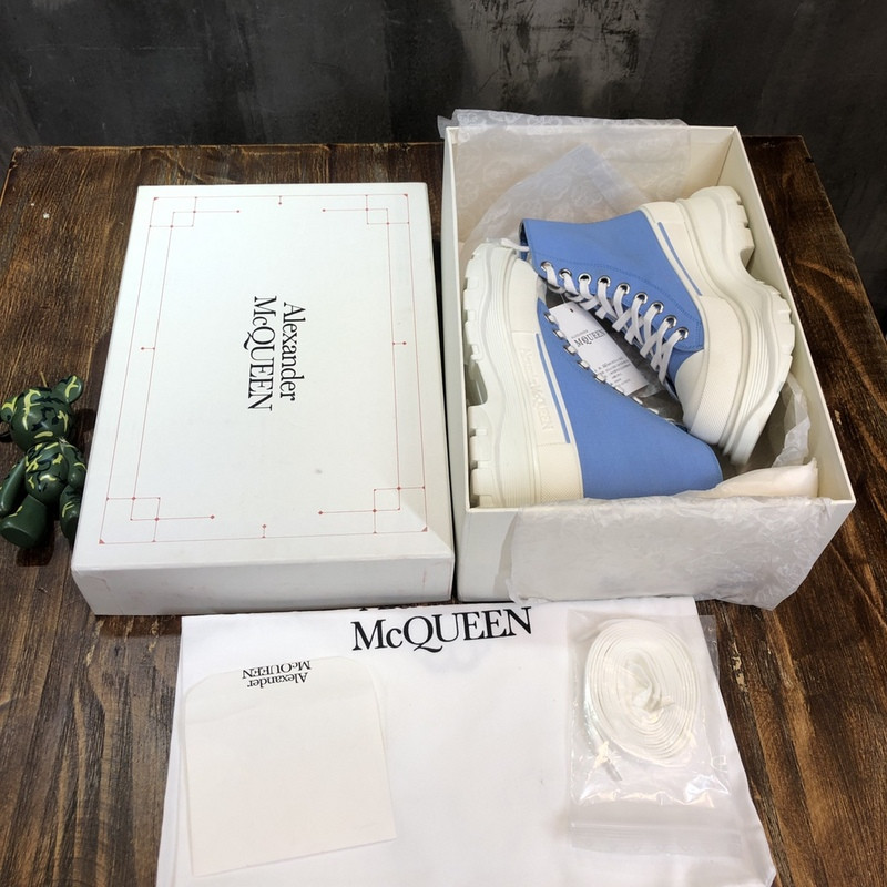 alex mcq tread slick boot in black