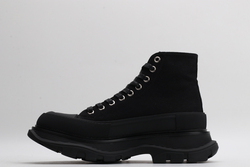 alex mcq tread slick boot in black with letters