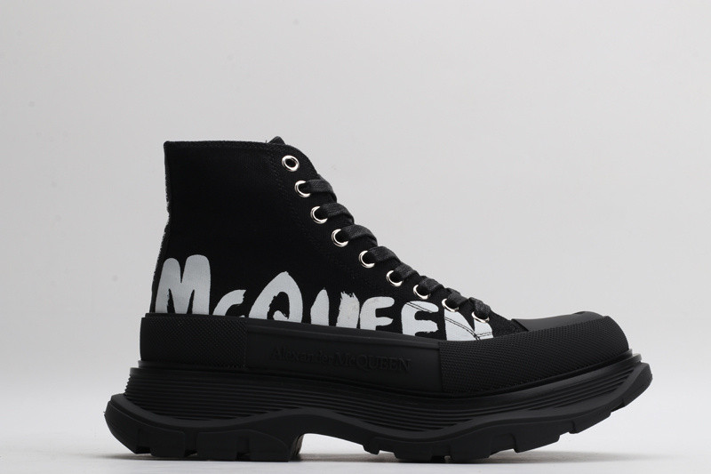 alex mcq tread slick boot in black with letters