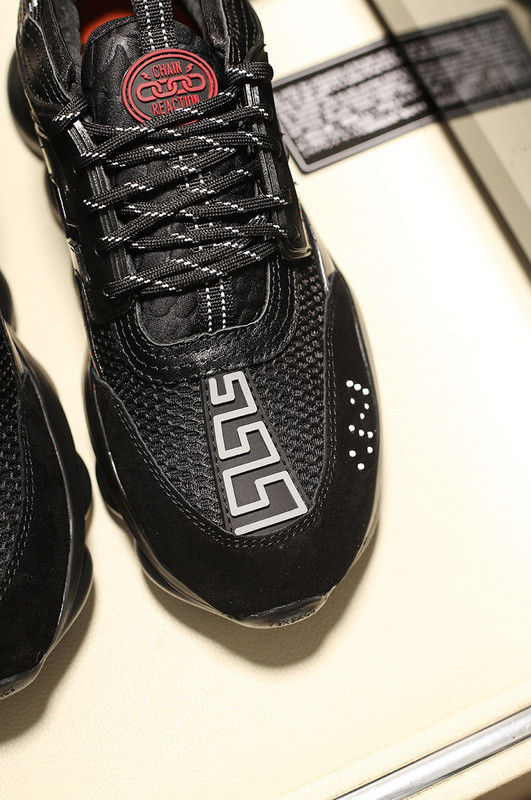 versace chain reaction triple black sneakers