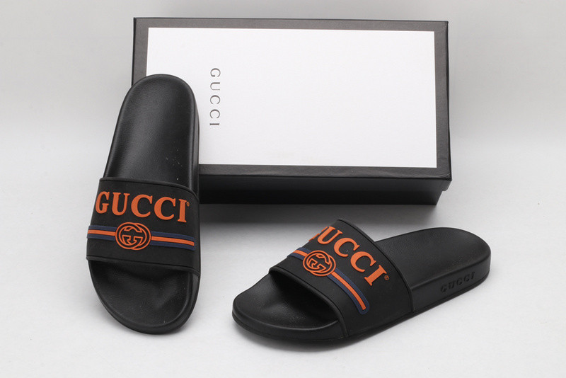 G*u*i slides all black with "orange G*u*i"