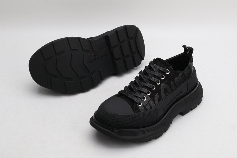 alex mcq tread slick lace up in black