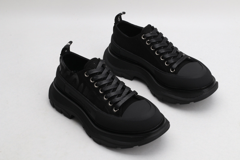 alex mcq tread slick lace up in black