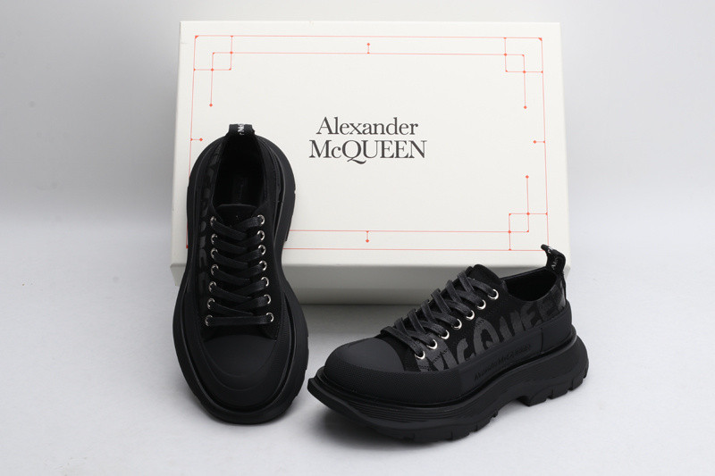 alex mcq tread slick lace up in black